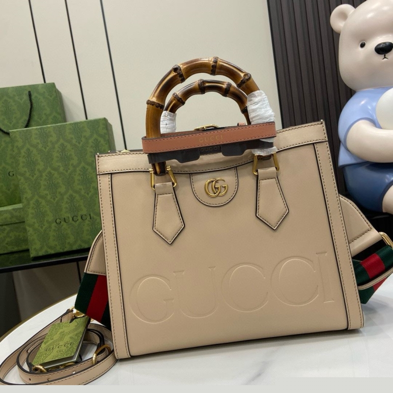 G*u*i top handle bags